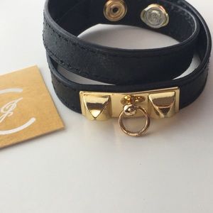 Black leather w/gold plated stud accent bracelet